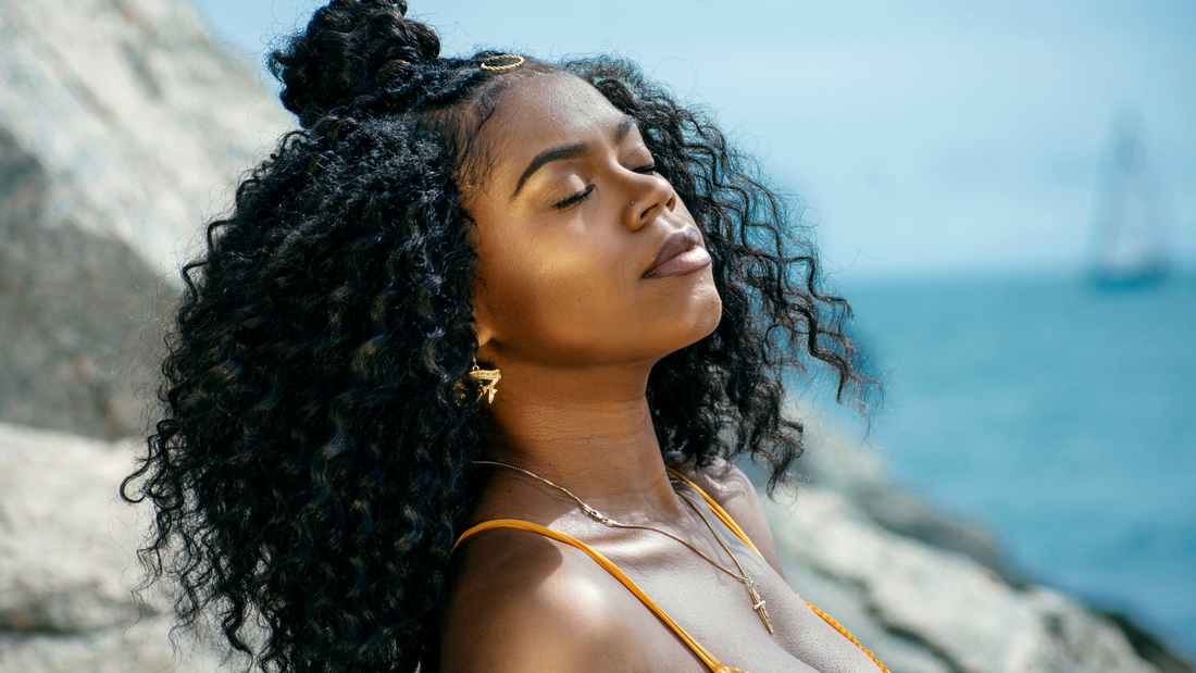 Confident woman enjoying a quiet moment of self-reflection while prioritizing her own needs and well-being.
